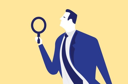 Illustration of a businessman in a blue suit holding a magnifying glass, looking to the right.