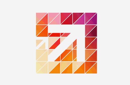 Colorful square mosaic forming a white geometric Z shape in the center.
